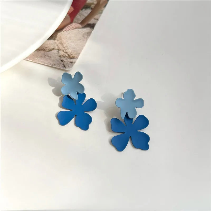 Boucles D'oreilles Fleur Supposée Bleues