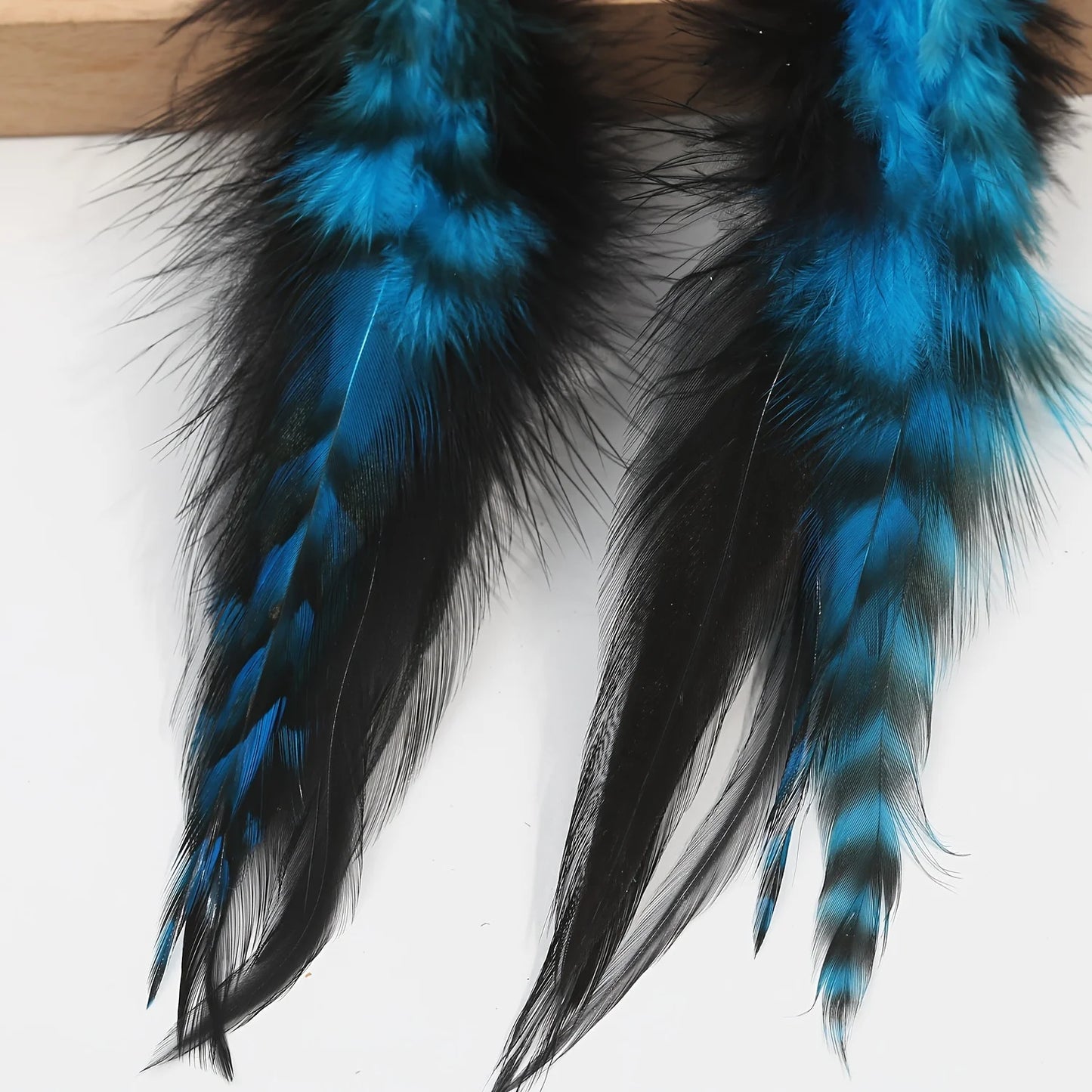 Boucles D'oreilles Plume Bleue Légère